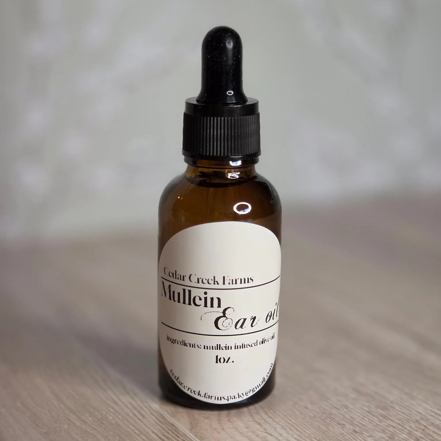 Cedar Creek Farms mullein ear oil front view with glass dropper bottle for natural ear support