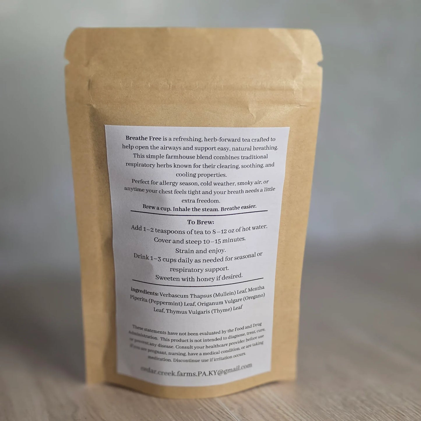 Cedar Creek Farms Breathe Free herbal tea blend back label showing ingredients, brewing instructions, and respiratory support details on kraft pouch
