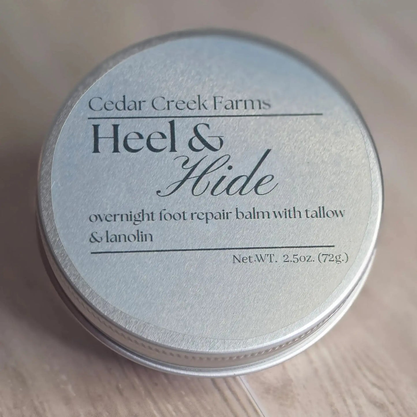 Cedar Creek Farms Heel and Hide overnight foot repair balm with tallow and lanolin tin top label front
