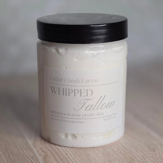 Cedar Creek Farms Whipped Tallow Butter front view in a glass jar for sensitive and acne prone skin with tea tree and frankincense