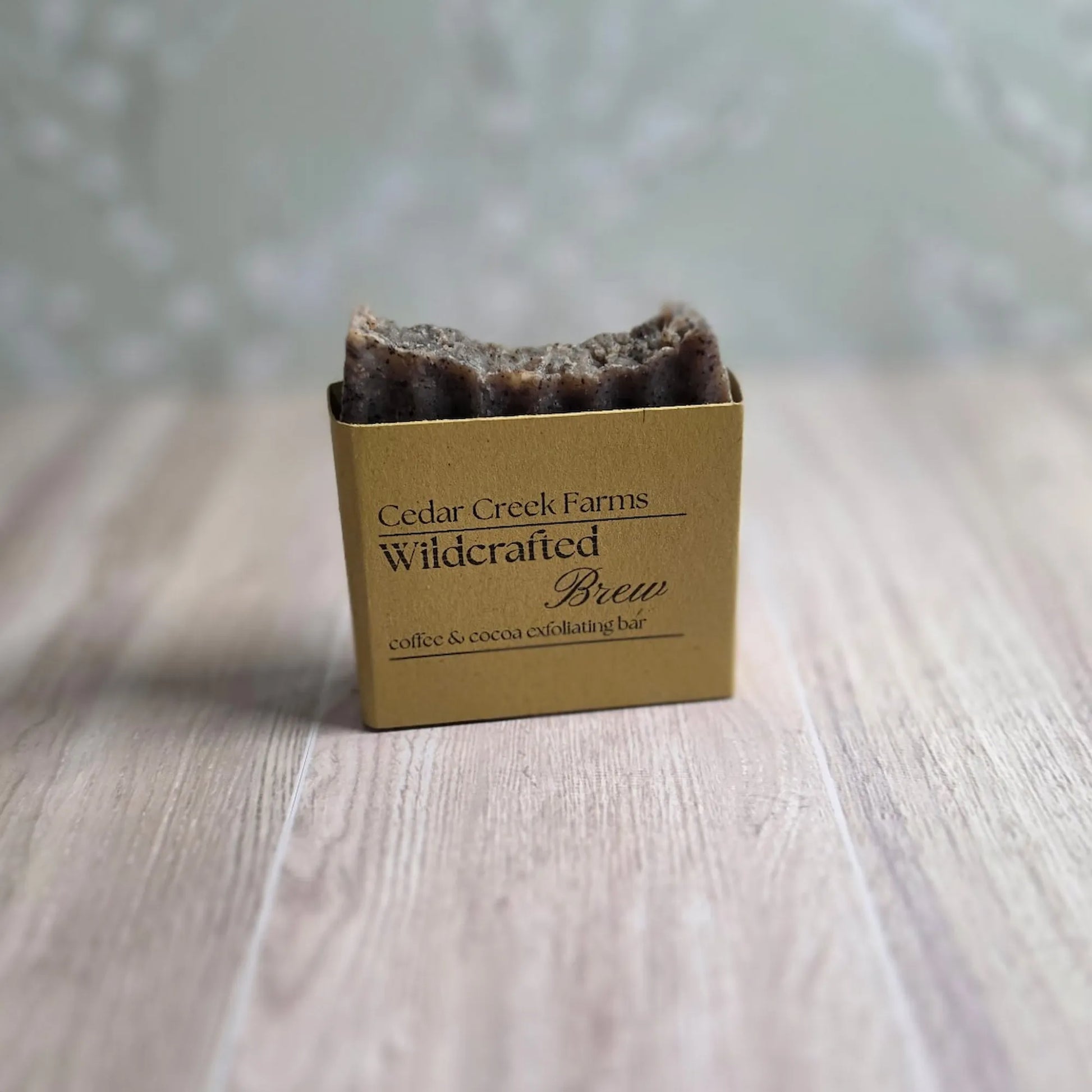 Cedar Creek Farms Wildcrafted Brew brown soap bar coffee and cocoa, natural exfoliating coffee soap on wood surface